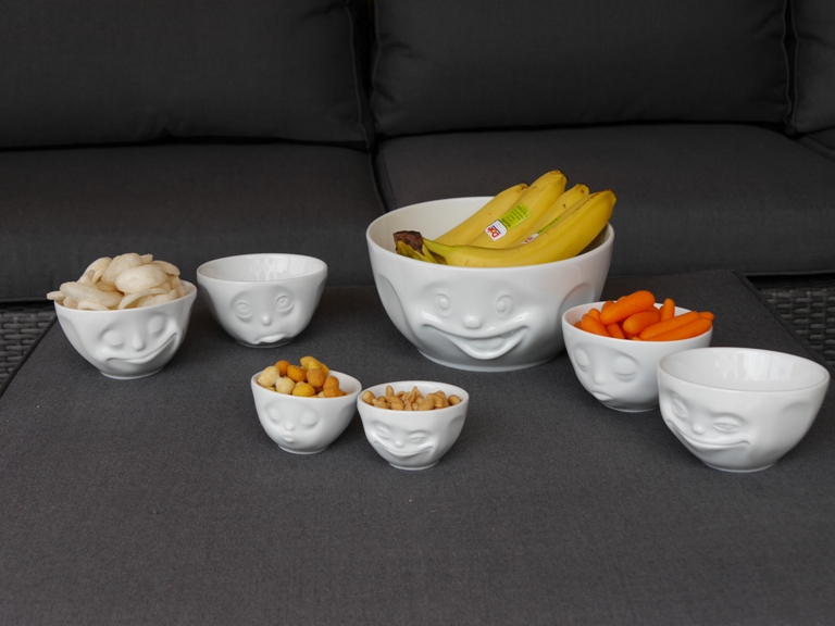 Maak je dag vrolijk met het happy faces porselein servies van TASSEN