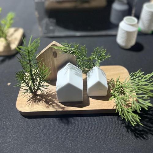 Räder Huisjes op houten plankje