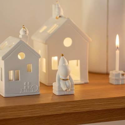Räder figuur Santa zittend op kadootje