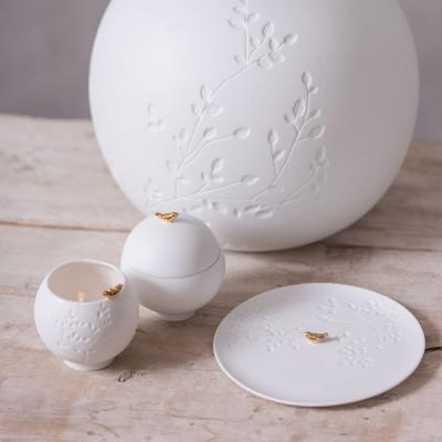 Räder porcelainstories potje met deksel vogel goud