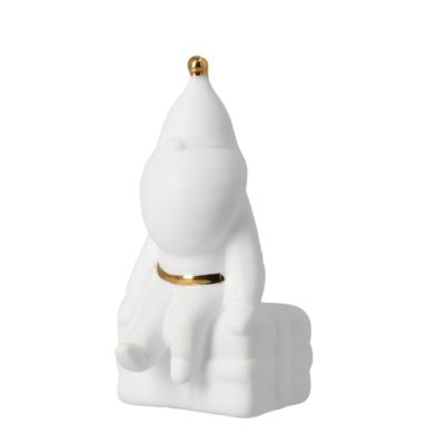 Räder figuur Santa zittend op kadootje